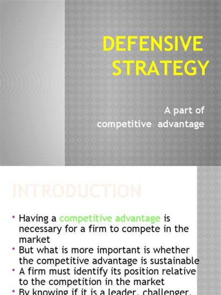 How is competitive advantage protected by using defensive strategies?